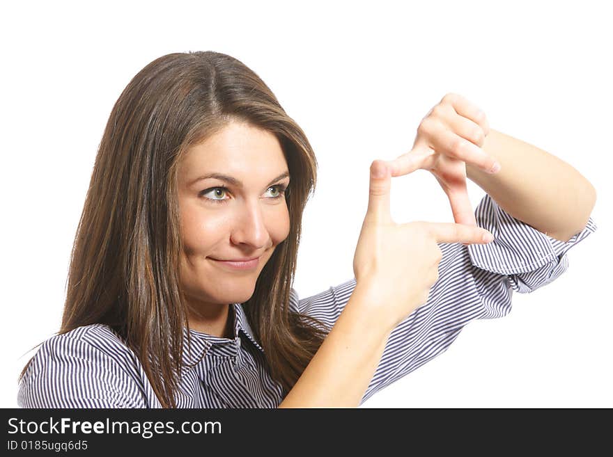 A woman looking threw her fingers