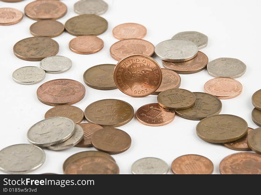 British pound coins isolated on white background. British pound coins isolated on white background