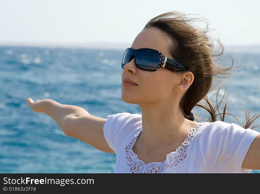 Young woman near a sea