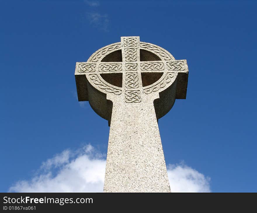 Old Celtic Cross Against Sky In Wales