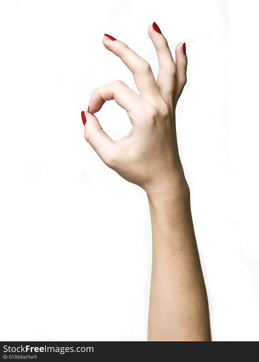 Womanish hand with a red manicure. Womanish hand with a red manicure