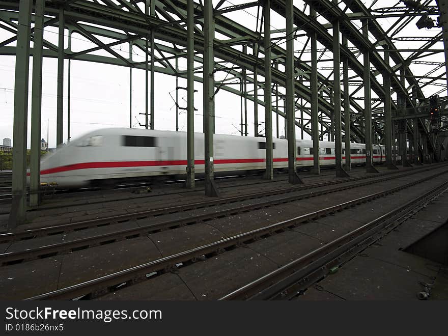 Speedy Train on Hohenzollern Bridge in Cologne, Germany. Speedy Train on Hohenzollern Bridge in Cologne, Germany.