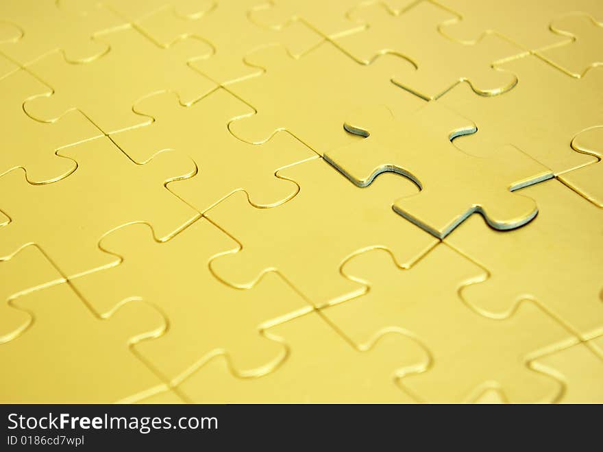 Gold puzzles for background. business concept