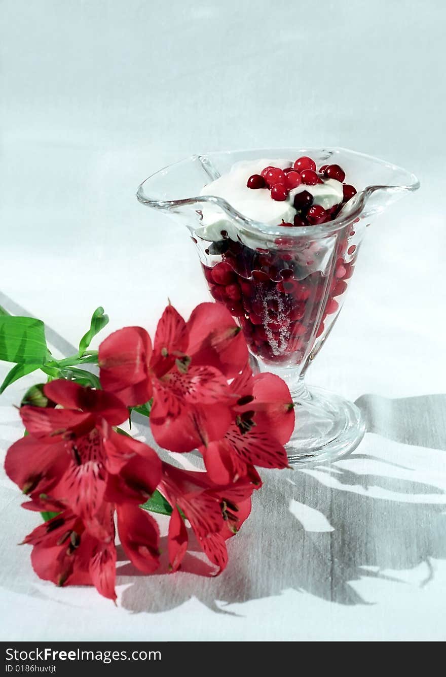 Red berry with cream and flower