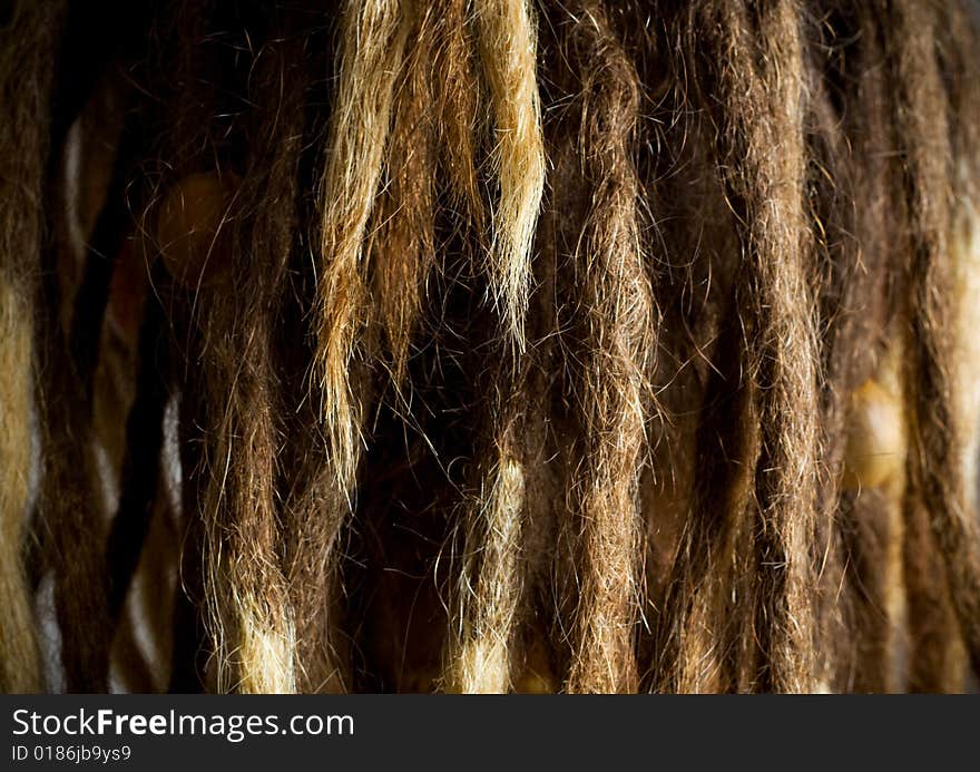 Hair background. Dreadlocks with accessories. Hair background. Dreadlocks with accessories.