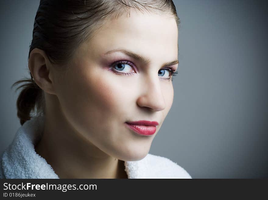 Beautiful girl in bathrobe.