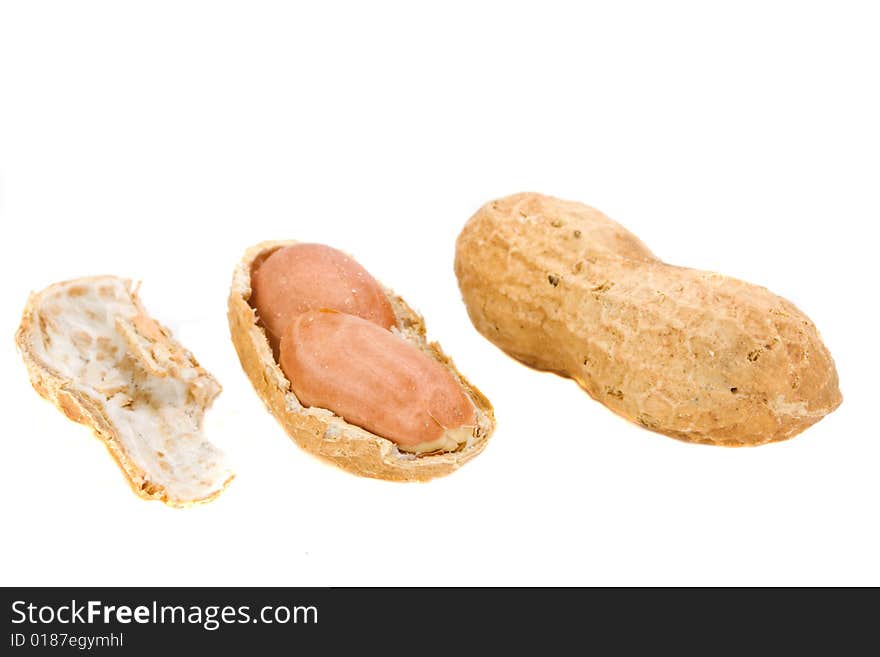 Some natural peanuts on white background