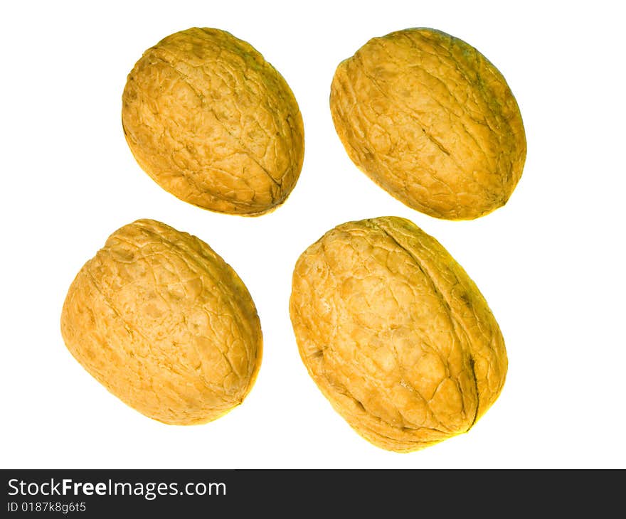 Opened nut on white background, shallow DOF