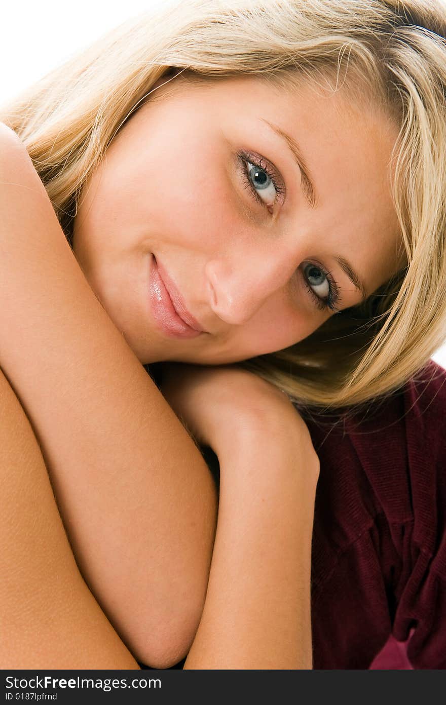 Closeup portrait of lovely blond with blue eyes