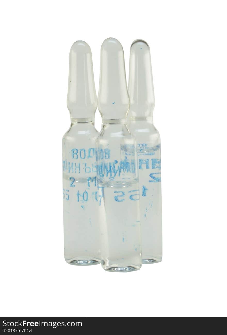 Three ampoules on the white background