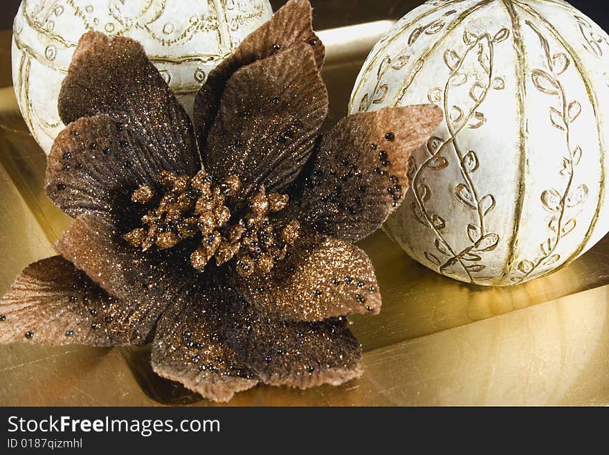 Christmas balls with brass flower. Christmas balls with brass flower