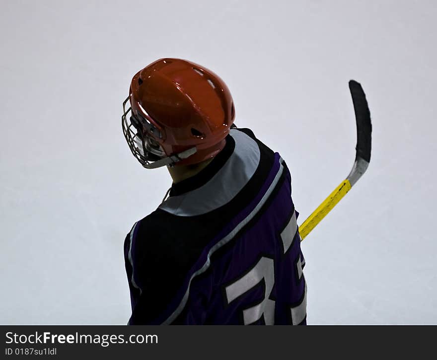 Hockey player from bird's eye view perspective. Hockey player from bird's eye view perspective