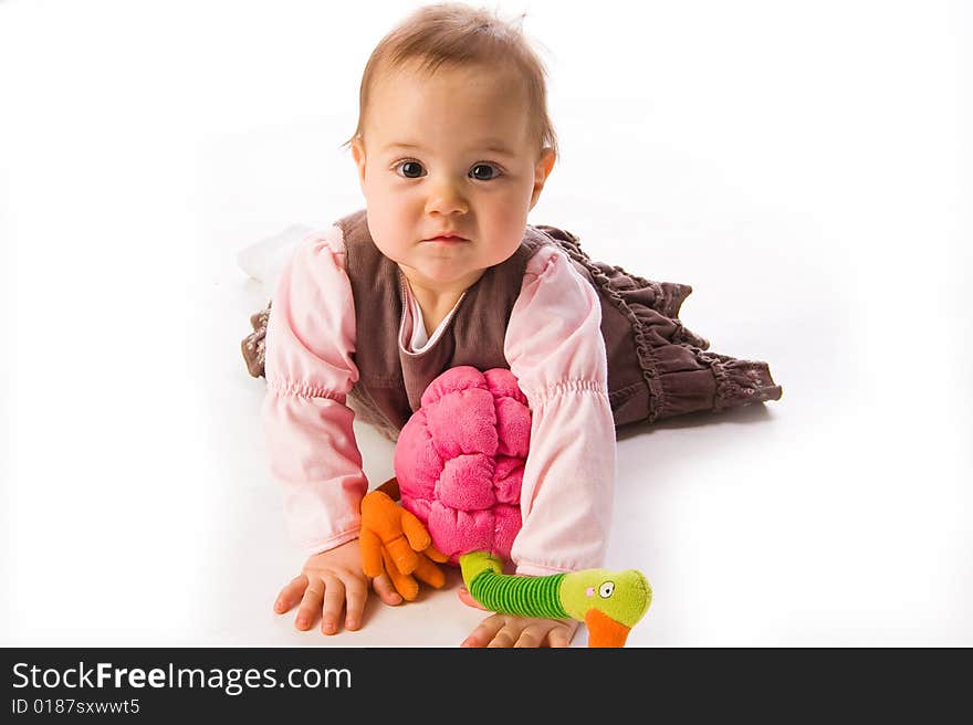 Little girl in dress looks at camera. Little girl in dress looks at camera