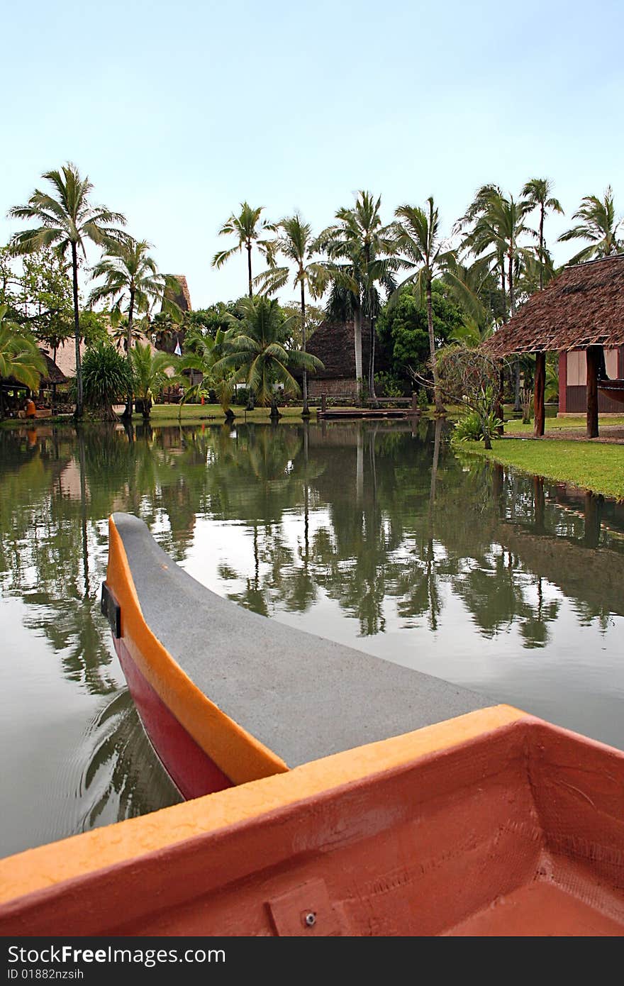 The front of a canoe approaches the shore at the Polynesian Cultural Center on O'ahu, Hawaii.