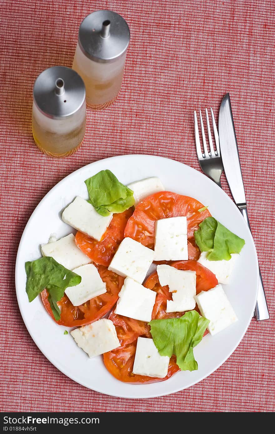 A fresh salad isolated over white background