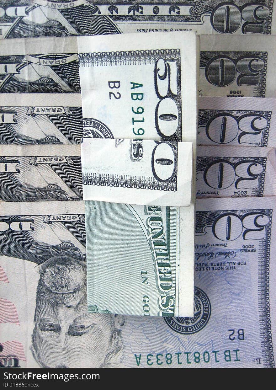 US money - 50 and a 500 (NOT) US dollar banknote.