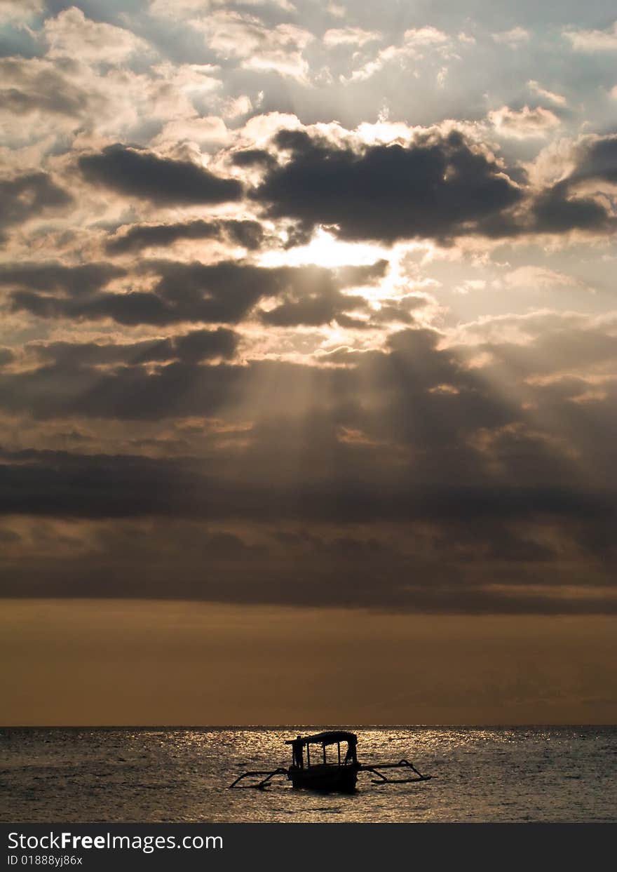 Silhouette photo of  boat in the sunset or sunrise. Silhouette photo of  boat in the sunset or sunrise