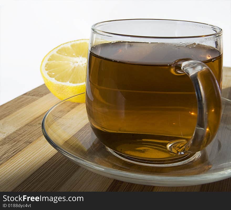 Black tea with yellow lemon. Black tea with yellow lemon