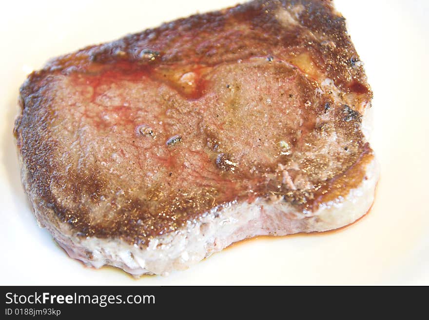 Large Grilled steak on the plate