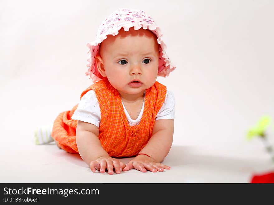 An image of cute baby in a studio. An image of cute baby in a studio