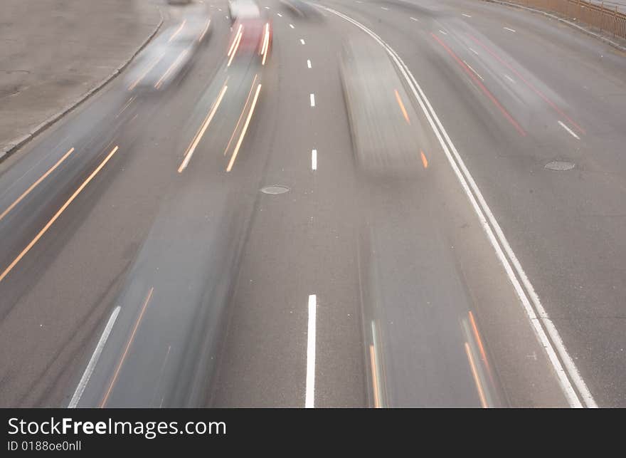 Highway with traffic car in a motion. Highway with traffic car in a motion