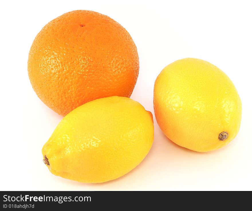 Orange and two lemons, isolated on white