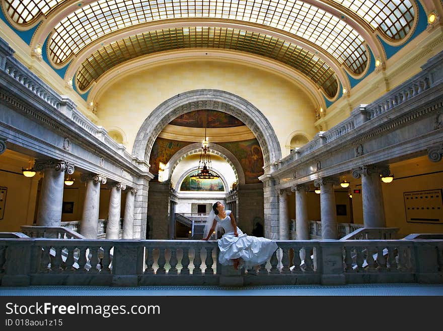 A bride waits for the groom to come. Taken in the historic Utah State Capitol building