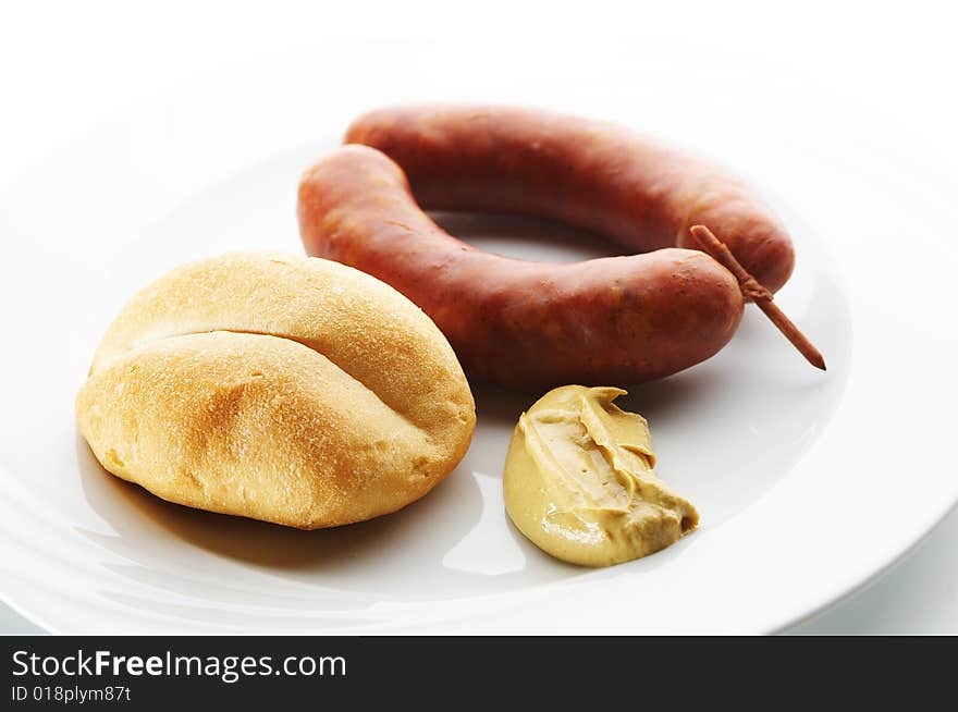 Kransky sausage with bread and mustard
 1