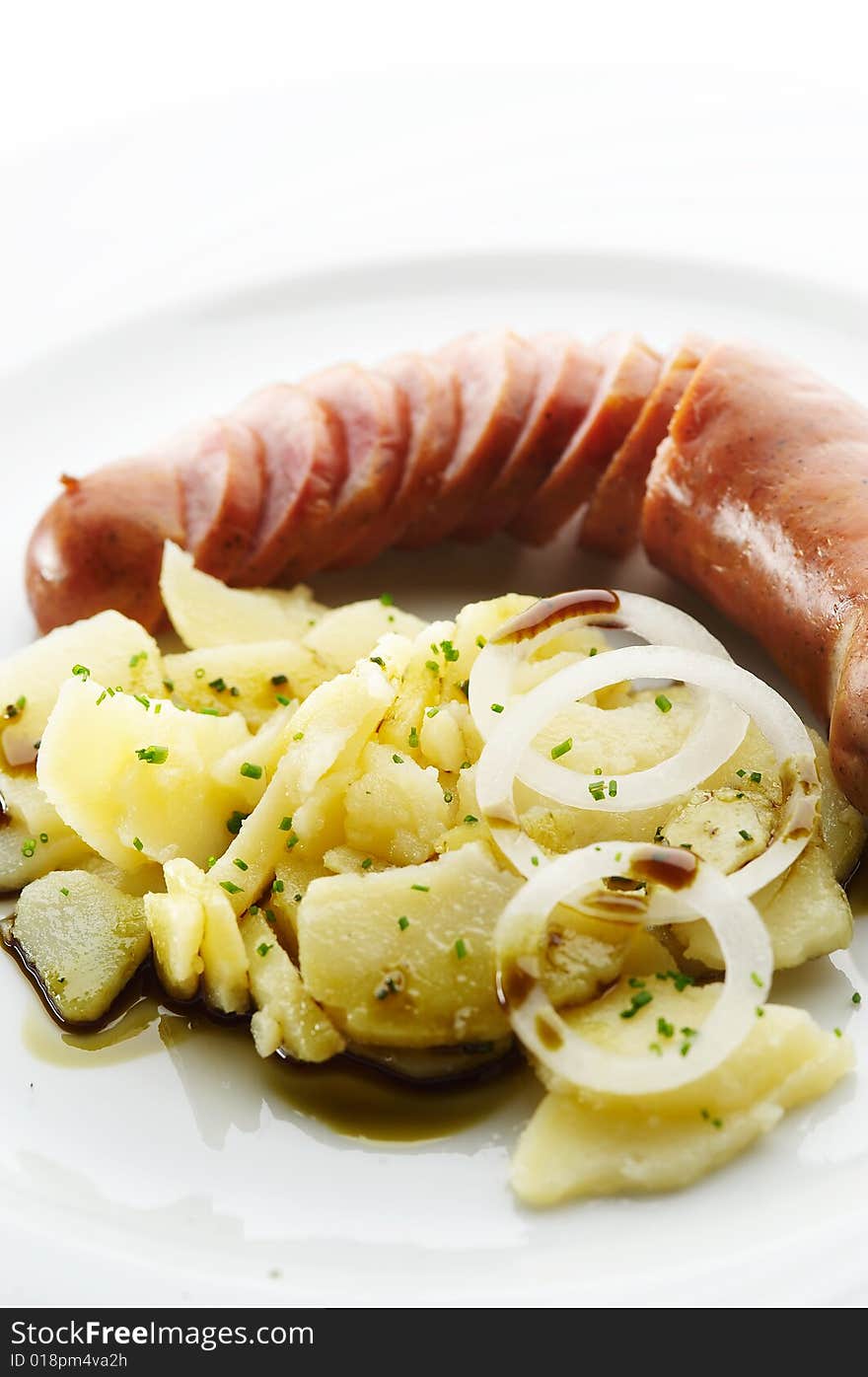 Kransky Sausage With Boiled Potato, Onion And Pump