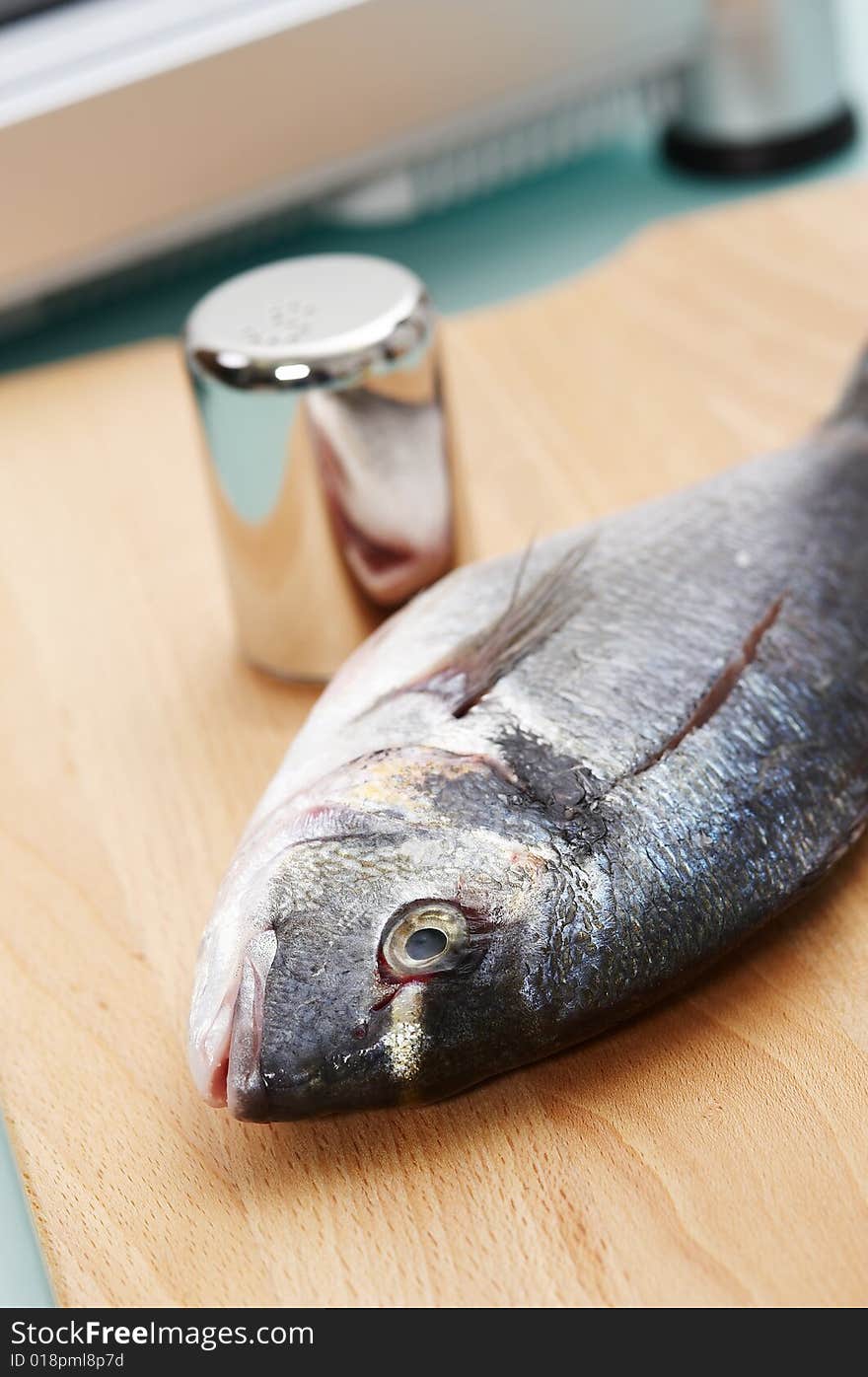 Fish ready to be salted for grill. Fish ready to be salted for grill