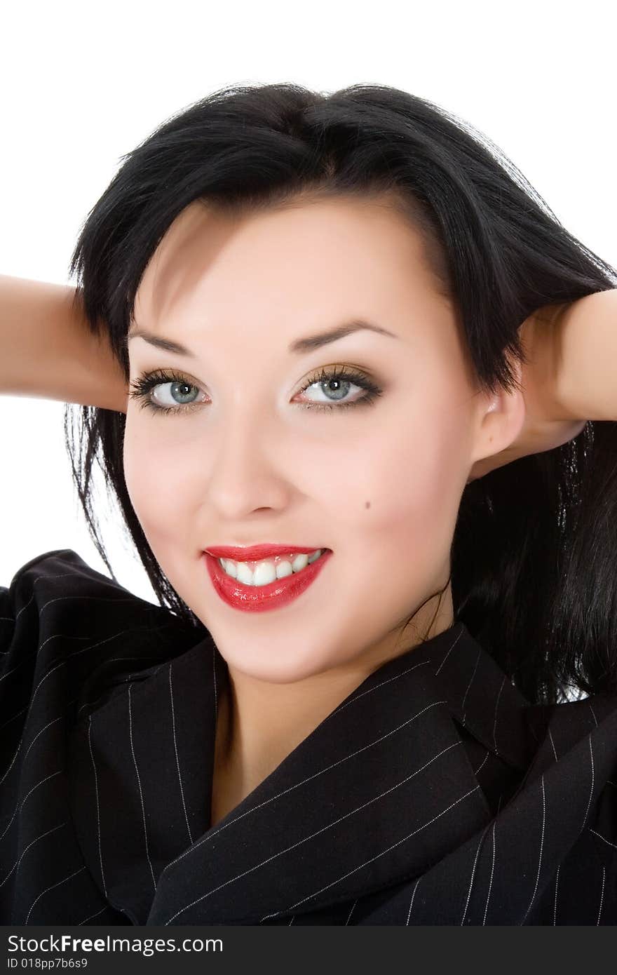 Portrait of the brunette with blue eye on white background