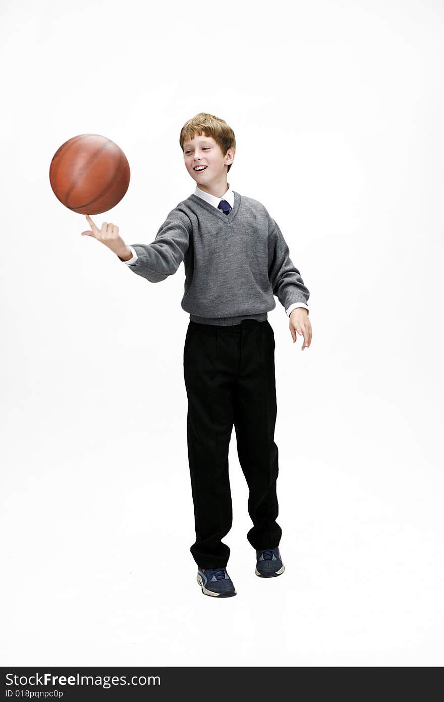 Cultured schoolboy with basketball ball. Cultured schoolboy with basketball ball