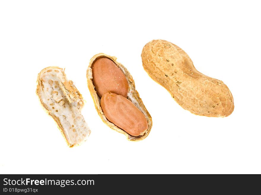 Some natural peanuts on white background