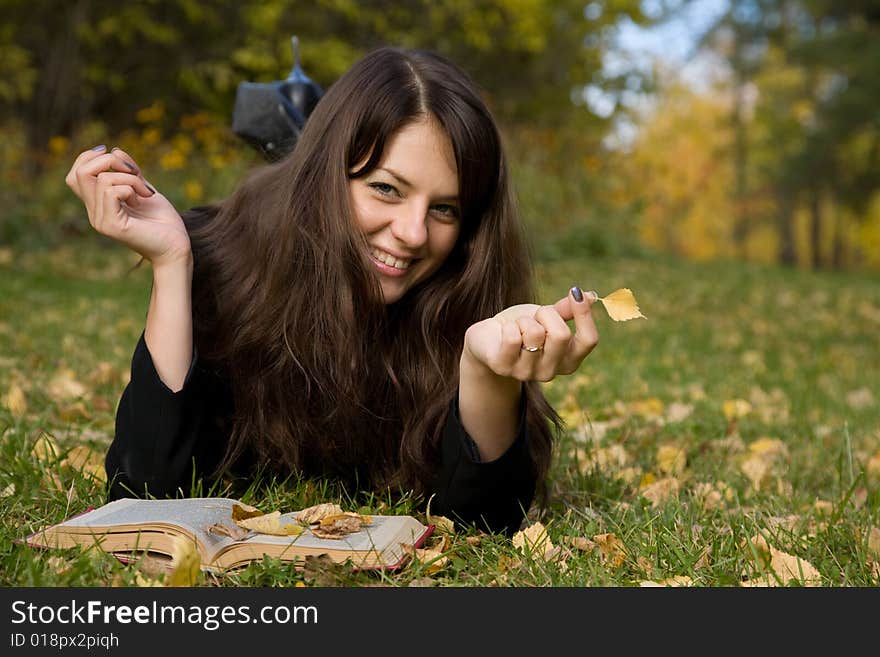 Young girl reading a book