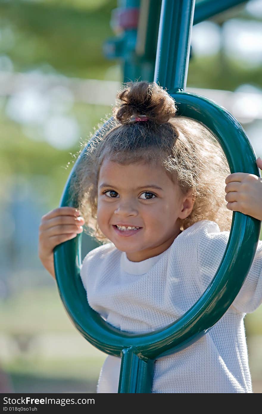 Girl Playing at the Playground. Girl Playing at the Playground