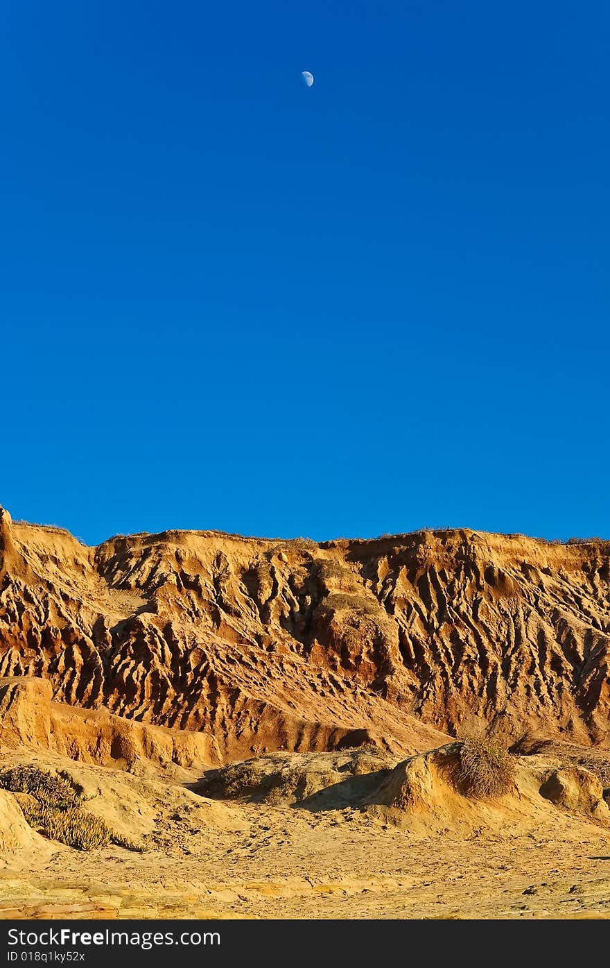 Moon Above Rough Terrain