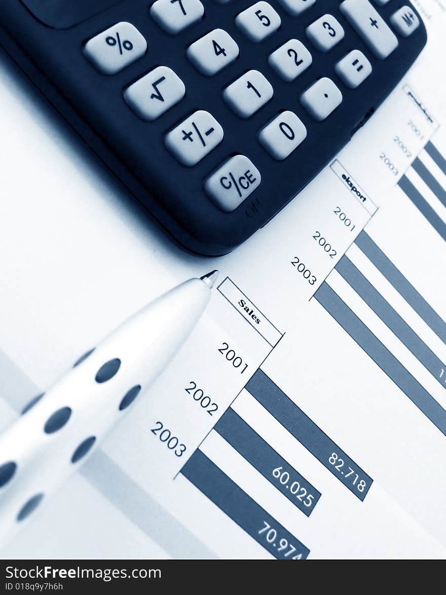 Business concept The calculator, pen and diagram