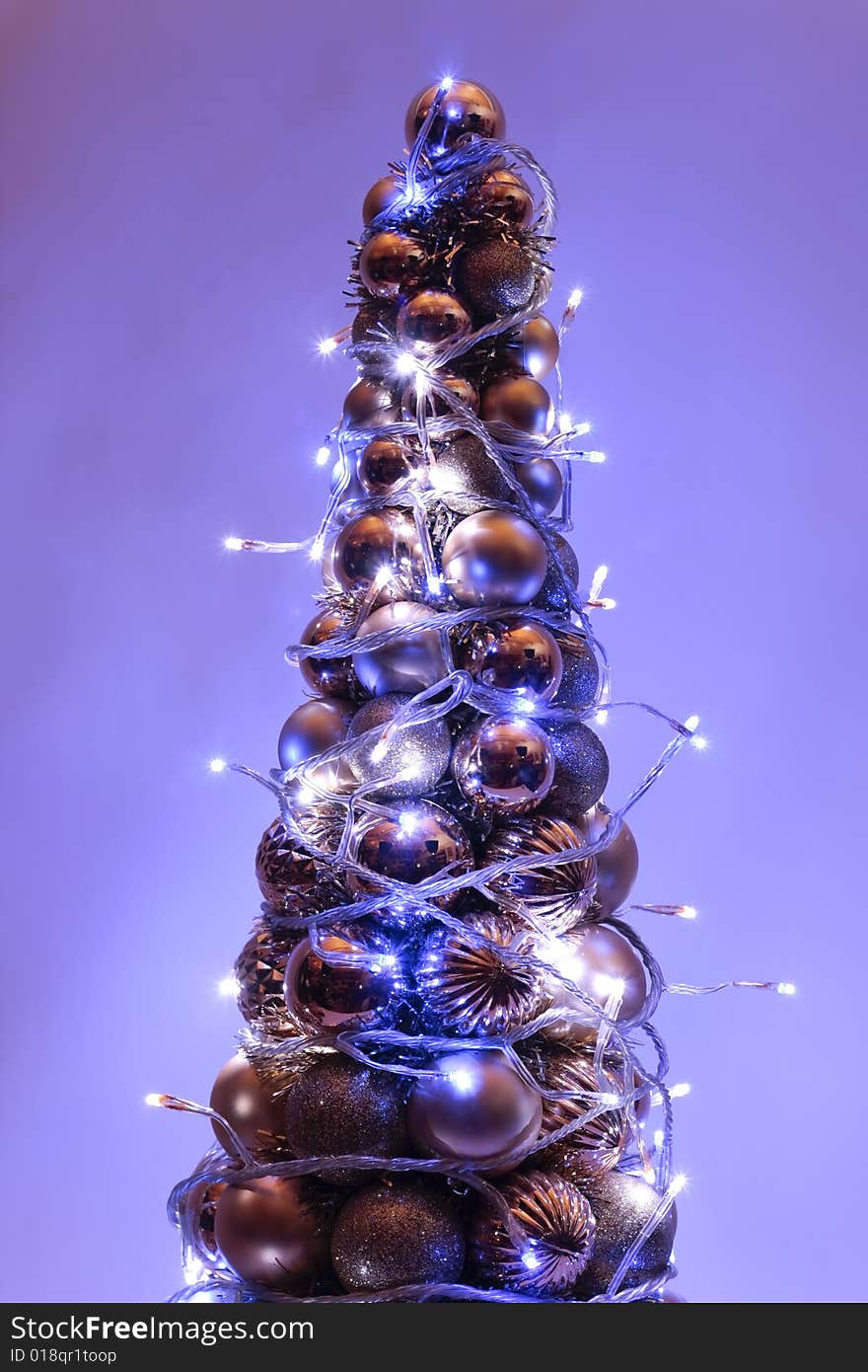 Christmas  ball tree with fairy lights. Christmas  ball tree with fairy lights