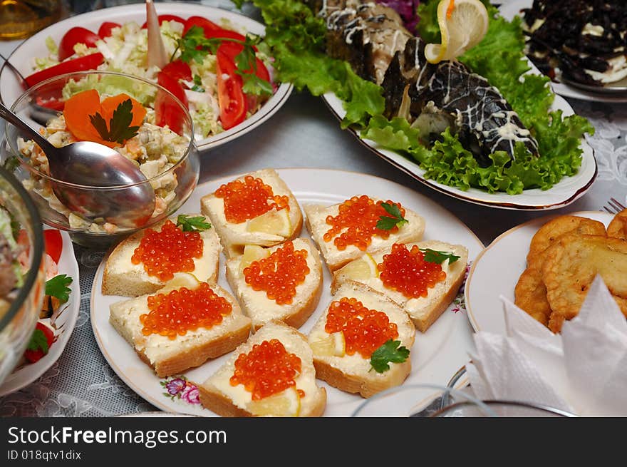 Table served with various dishes. Table served with various dishes