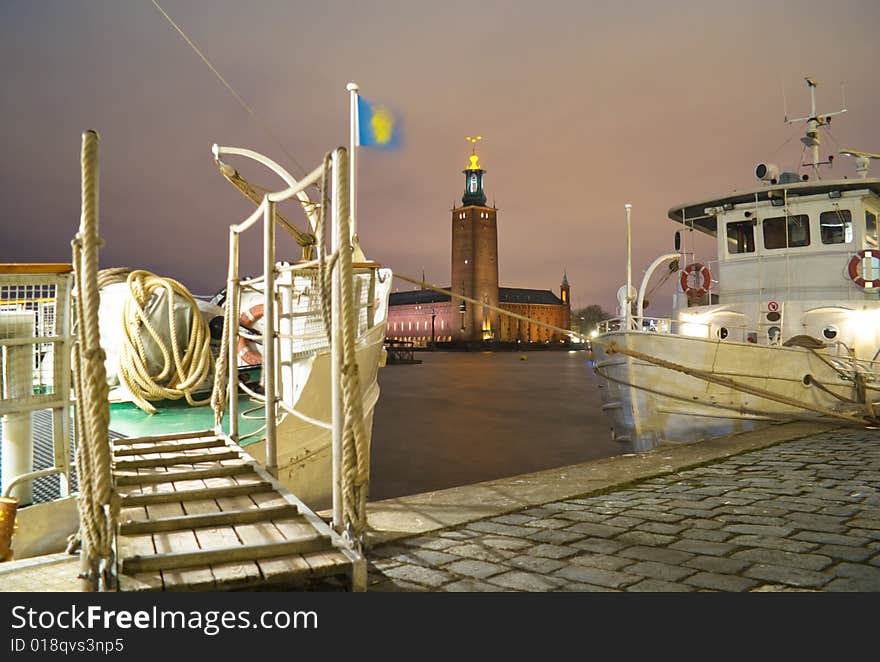 Stockholm City Hall as seen from Riddarholmen. Cloudy sky, windy and no snow, temperature +2 Celsius. Stockholm City Hall spreads some light and makes the terrible Swedish winter night a little bit easier to endure.

This is where the annual Nobel Prize banquet is held on December 10.