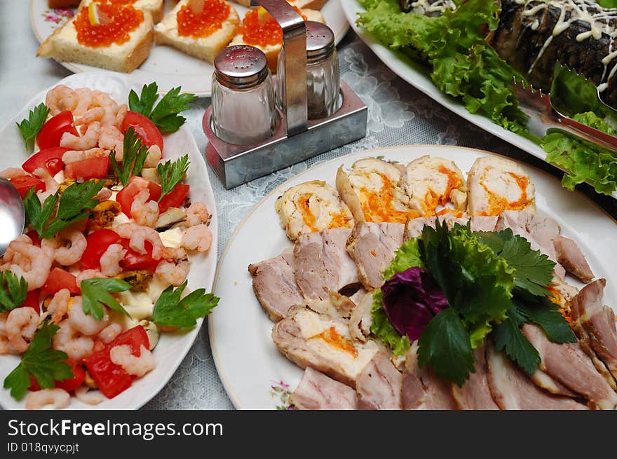 Table served with various dishes. Table served with various dishes