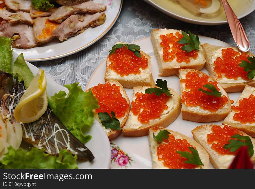 Table served with various dishes. Table served with various dishes