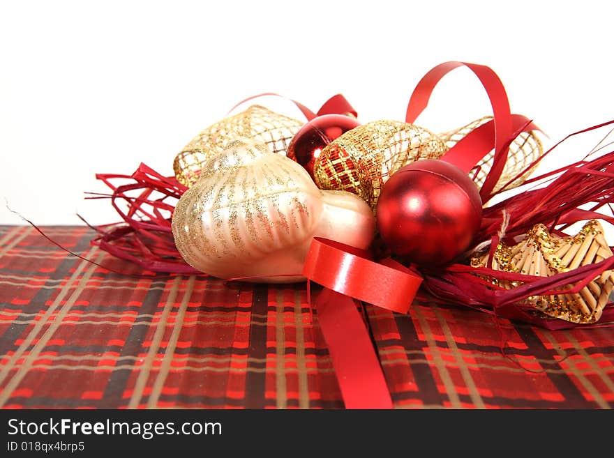 Detail of christmas present in red paper with unusual decorations