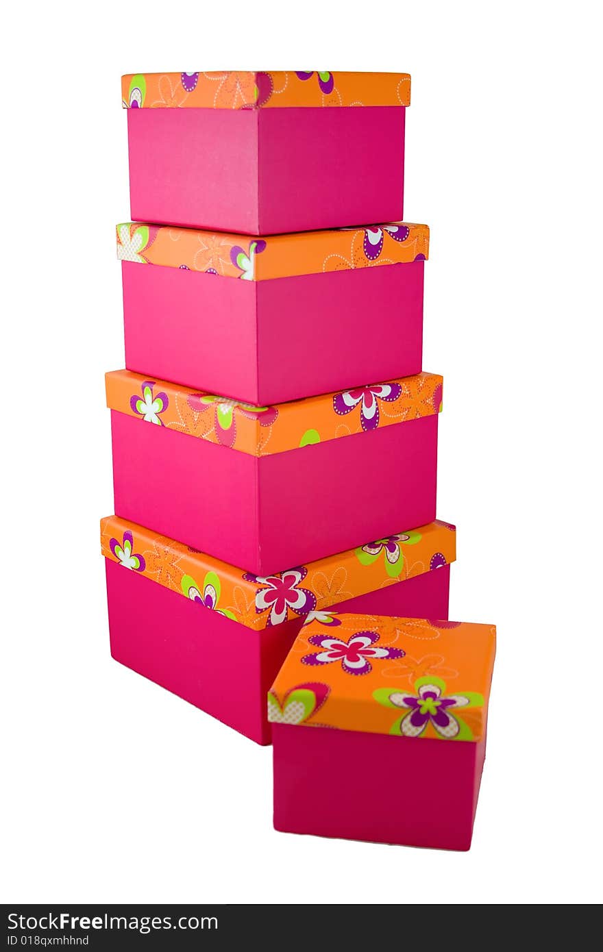 A huge stack of pink with orange flowered top presents. A huge stack of pink with orange flowered top presents.