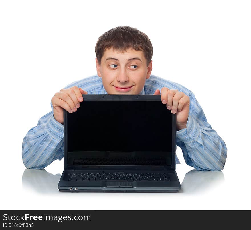 Artful man behind the laptop, isolated on white