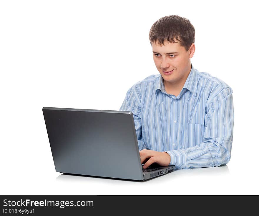 Young adult businessman working with laptop