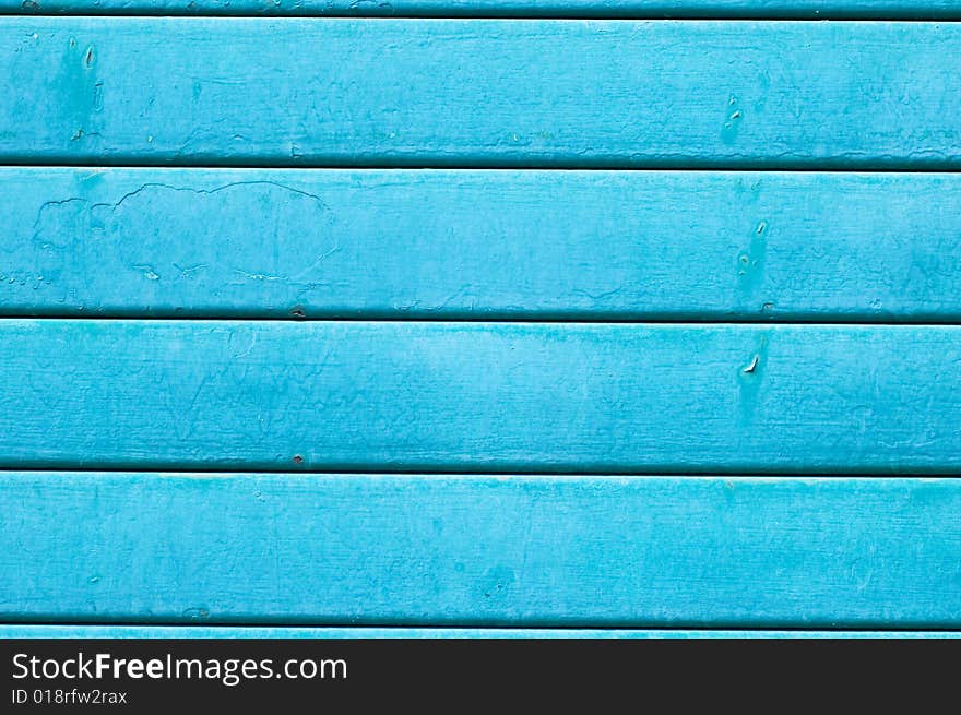 Detail of a blue striped garage door. Detail of a blue striped garage door