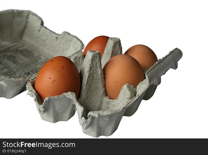 Brown eggs in eggbox