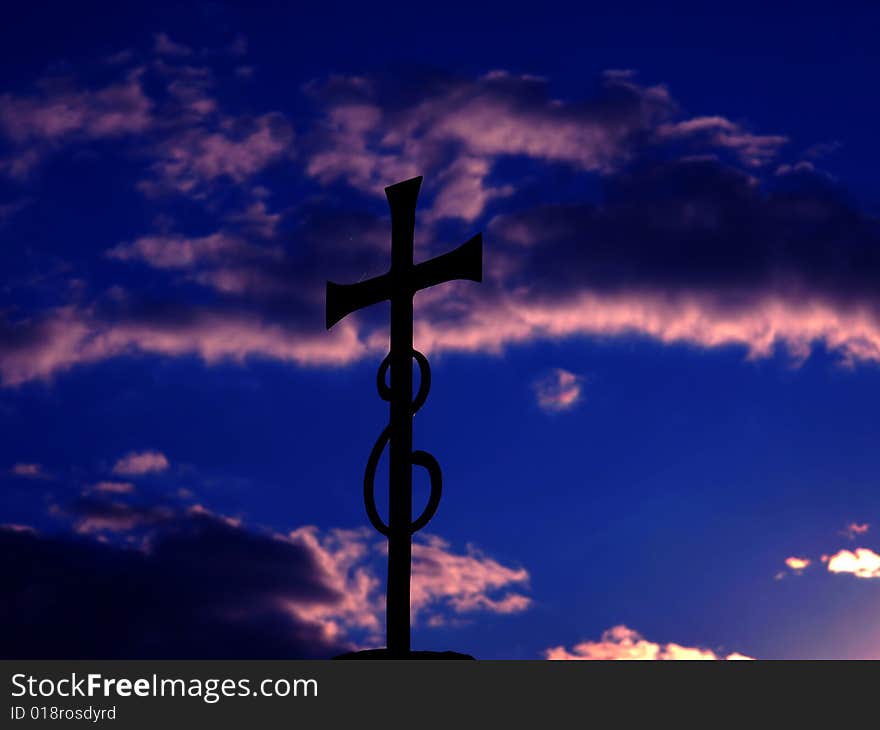 Cross and clouds in the sky