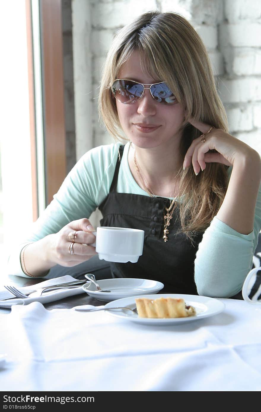 The young girl in cafe. The young girl in cafe